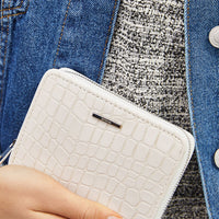 Square purse with detailing