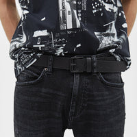 Embossed faux leather belt