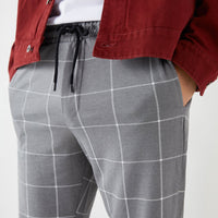 Drawstring checked jogging trousers