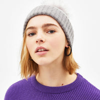 Hat with faux fur pompom