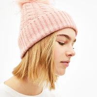 Hat with faux fur pompom
