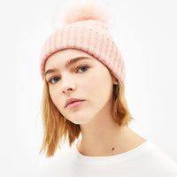 Hat with faux fur pompom
