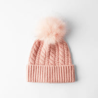 Hat with faux fur pompom
